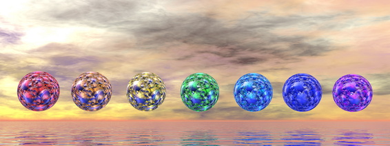 Colorful chakra spheres by sunset - 3D render